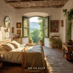 a bedroom with an arched window and stone floor