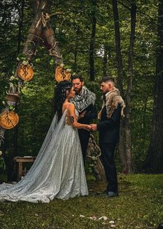 a couple getting married in the woods