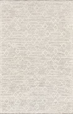 an area rug with white and grey colors