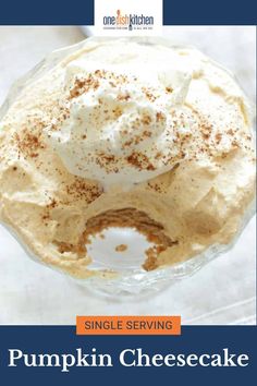 pumpkin cheesecake in a glass bowl with cinnamon sprinkles