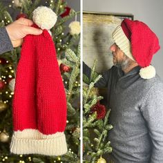 a man wearing a red and white knitted hat next to a christmas tree