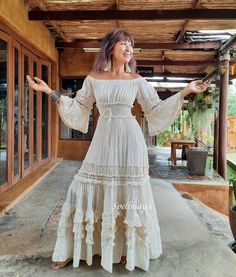 Long Cream Bohemian Dress, Bohemian Long Cotton Dress, Bohemian Cotton Dress With Long Skirt, Beige Bohemian Long Maxi Dress, Bohemian Floor-length Beige Dress, Bohemian Beige Floor-length Dress, Bohemian Flowy Long Dress, White Bohemian Maxi Dress With Ruffles, Bohemian Long Skirt Dress With Ruffles