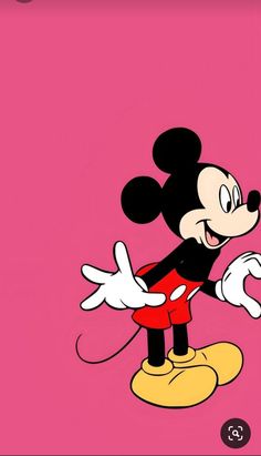 a cartoon mickey mouse with red shorts and white shoes, standing on a pink background