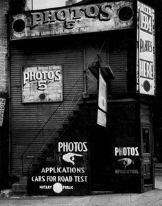 black and white photograph of an old photo shop