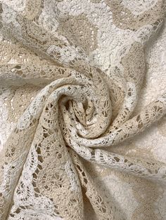 an image of a white lace fabric