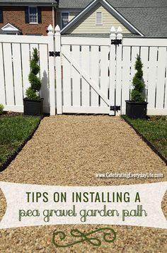 a gravel garden path in front of a white picket fence with the words tips on installing a peal gravel garden path