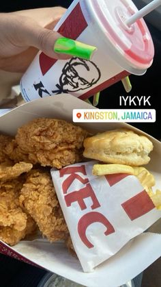 fried chicken, macaroni and cheese on a paper plate with a cup of ketchup