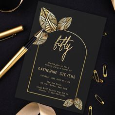 a black and gold party card with leaves on it