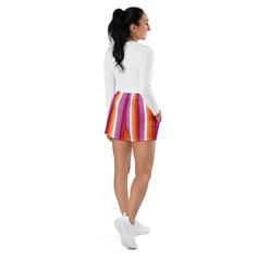 Add these cute lesbian shorts to your pride wardrobe. These lesbian sunset flag stripe shorts are a great way to show off your gay pride and not only are they super cool for pride events and festivals, they are functional athletic shorts made for swimming, running and other sporting activities and you'll won't want to be without them when heading to the beach or lounging by the pool. You'll also appreciate the mesh pockets large enough to hold your phone. DETAILSComfortable elastic waistband wit Local Pride, Pride Parade, White Flats, Gay Pride, Striped Shorts, Athletic Shorts, Active Wear, Stripes, Wardrobe