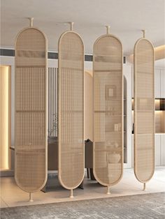 the room dividers are made out of bamboo and have multiple sections on each side