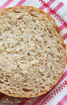 a piece of bread sitting on top of a red and white towel