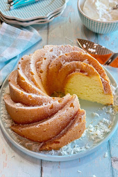 A coconut cream cheese pound cake with a missing slice. Whipping Cream Pound Cake, My Country Table, Cream Cheese Bundt Cake, Coconut Cream Cheese, Cheese Pound Cake, Cream Cheese Pound Cake, Country Table, Berries Recipes, Bundt Cakes Recipes