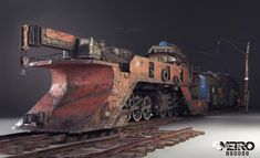 an old rusty train car sitting on top of some railroad tracks in front of a dark sky