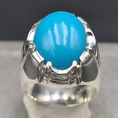 Dark Blue Natural Nishapuri Feroza Turquoise Ring Stone Is 100% Natural Beautiful Clean Blue Piece Handmade New Elegant Design, Designed by one of our Team Member High quality feroza Stone weight around 3+ grams We can Resize the ring as per buyer Choice We do ship through FedEx in Three working days Please Feel Free to contact me any time Thanks Oval Blue Gemstones With Polished Finish, Blue Oval Cabochon Gemstones, Oval Blue Cabochon Gemstones, Blue Untreated Round Turquoise Ring, Untreated Blue Turquoise Ring, Blue Turquoise Ring With Large Stone In Sterling Silver, Blue Cabochon Gemstones For Rings, Blue Rings With Polished Finish As A Gift, Blue Rings With Polished Finish For Gift