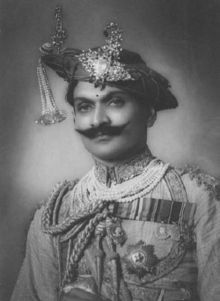 an old photo of a man with a moustache on his face and mustache