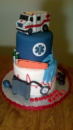 a cake decorated with medical items on top of a table