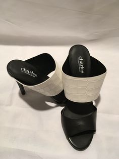 NWOB CHARLES BY CHARLES DAVID SLIP ON STILETTO STRAPPY HEELS BLACK WHITE SZ 6.5 -NEVER WORN Great price! Trusted and Top Seller Fast Shipping Thanks for Looking WH Black Double Strap Footbed Sandals With Heel Loop, Black Strappy Heels, Black Synthetic T-strap Sandals With Buckle Closure, White Slip, Strappy Heels, Black Heels, Slip On Sandal, Mule Shoe, Slip On