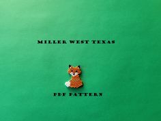 a piece of bead art with the words miller west texas and a fox on it