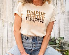 Keywords: Mama shirt, Leopard mama shirt, Women shirt, mother's day tshirt, gift for her, gift for mom, mother's day gift, mom tshirt, cute gift, fearless tshirt, mama shirt, mother's day, mom, bruh Shirt Design Color Option: White, Black, Pink, Light Blue, Royal Blue, Purple, Yellow, Orange, Hot Pink, Gold Metalic, Silver, Rose Gold, Glitter Gold, Glitter Silver, Giltter Rose Gold, Glitter White and Glitter Black ❤❤ SHIRT INFO❤❤ Our t-shirts are SUPER  soft and SUPER comfy. Sleeves are only rol Mother's Day Shirt With Custom Print And Relaxed Fit, Relaxed Fit Shirt With Custom Print For Mother's Day, Casual Shirt With Custom Print For Mother's Day, Relaxed Fit Pre-shrunk Shirt For Mother's Day, Relaxed Fit Top For Mother's Day Gift, Casual Shirt With Name Print For Mother's Day, Graphic Tee Shirt For Mother's Day Gift, Mother's Day Gift Shirt With Text Print, Short Sleeve Shirt For Mother's Day Gift