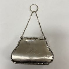 "m101 Antique Silver Clutch Coin Change Cards Ladies Purse Evening Handbag PLEASE READ ENTIRE DESCRIPTION BEFORE PURCHASING Antique Silver Ladies Purse Clutch on a short chain. Used for coin change, cards, jewelry, etc. Engraved \"Phyllis from Grandma Driman\" Approx. measurements 4.5\" x 3\" x .75\". Brown Lining inside. Partially stained. Pre-owned vintage item. Good condition for it's age. Partial discoloration. Sold as is, as seen on pictures, no returns on vintage/antique items. We do not a Money Pouch, Silver Clutch, Emotional Baggage, Ladies Purse, Vintage Clutch, Evening Handbag, Vintage Bag, Gold Filigree, Purse Clutch