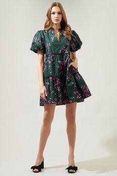 Say hello to the dress you can wear to almost any occasion. A classic pink floral motif lays against an emerald color to decorate the Anissa Floral Babydoll Dress. It features puff sleeves around the shoulders and three layers of tiers to compliment the dress. A split neckline is highlighted by billowy short sleeves in this mini dress. - Split neckline- Bubble sleeves- Babydoll- Pocket- Color: Emerald multiSize + Fit - Model is 5'8" and wearing size XS- Measurements taken from size S - Chest: 19 Floral Babydoll Dress, Bubble Sleeve, Emerald Color, Babydoll Dress, Floral Motif, Puff Sleeves, Say Hello, Pink Floral, Puff Sleeve