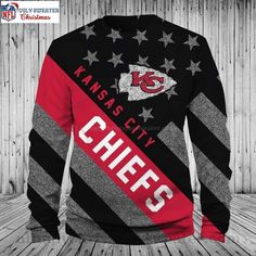 a black and red sweater with the kansas chiefs on it