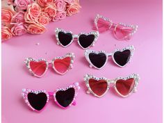 "Heart shaped custom sunglasses encrusted with crystals and pearls. A perfect accessory for the bride to be to make your special day unique and memorable. These charming sunglasses are customizable for a personal touch to your wedding ensemble. Perfect for your bridal shower, bachelorette party, hens party, honeymoon and birthday parties. 💕CUSTOM CRAFT: Each pair of sunglasses is hand-crafted and can be customized with \"Bride To Be\" letters or choose your own text/name for a unique look! 💕HEART-SHAPED: These sunglasses are designed with romantic heart-shaped lenses that beautifully capture the essence of love and celebration, making them a standout accessory for the bride. 💕RETRO: These retro Inspired sunglasses are stylish and is a guaranteed hit with all of your bridesmaids! 💕QUALI Sunglasses Bachelorette Party, Sunglasses Bachelorette, Bachelorette Party Decoration, Bride Sunglasses, Bachelorette Party Sunglasses, Bride Hair Pins, Hen Party Gifts, Bride To Be Sash, Bride Veil