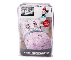 the twin comforter is pink and has minnie mouses on it's head