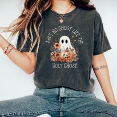 Check out this comfort colors© Show your spirit this season with our 'Ain't No Ghost Like the Holy Ghost' t-shirt--where faith and fun come together in perfect harmony! Unfortunately we do not offer returns or exchanges as these are printed per order. If you have any manufacturing issues we will do our best to make it right.    https://gndesignertees.etsy.com Comfort Colors introduces its garment-dyed t-shirt; a fully customizable tee made 100% with ring-spun cotton. The soft-washed, garment-dyed fabric brings extra coziness to your wardrobe while the relaxed fit makes it an excellent daily choice. The double-needle stitching throughout the tee makes it highly durable while the lack of side-seams helps the shirt retain its tubular shape. .: 100% ring-spun cotton .: Medium fabric (6.1 oz/yd Church Halloween, Nurse Halloween Shirt, Catholic Shirt, Trunk Or Treat Ideas, Nurse Halloween, Colors Show, Stay Spooky, Halloween Nurse, Religious Shirt