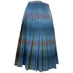 1950’s original " tournabout " reversible shadow plaid pleated skirt designed and woven by Pendleton Woolen Mills features blues and greens in the softest shades . Beautifully pleated and designed with double-sided zipper and side button closure. Waist measures 26 inches Upcycle Vintage, Pendleton Woolen Mills, Plaid Pleated Skirt, Blues And Greens, Pendleton Wool, Vintage Clothes, Upcycled Vintage, Skirt Design, Tie Dye Skirt