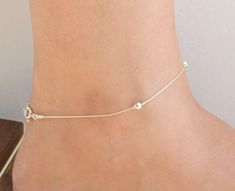 "Sterling Silver anklet,silver anklet,dainty anklet,minimalist anklet,Silver Anklets for Women, Ankle Bracelet, Foot Jewelry, Ankle Bracelet Get ready for the Summer! Simple classic minimalist everyday sterling silver anklet . Very delicate and dainty Length - 9\" + 1.5\" adjustable chain extender. Made from 925 sterling silver . If you would like this chain altered, please convo me. All my jewelry are packed in an elegant gift box. If you want to give it as a gift you can specify the address an Silver Minimalist Anklets For Gift, Minimalist Hypoallergenic Sterling Silver Anklets, Minimalist Sterling Silver Anklet With Adjustable Chain, Minimalist Sterling Silver Anklets In Silver, Delicate Adjustable Silver Anklets, Elegant Silver Anklets With Tiny Beads, Dainty Sterling Silver Anklets, Minimalist Silver Anklets With Adjustable Chain, Silver Anklet With Delicate Chain As Gift