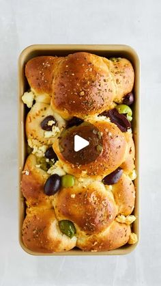 Alia & Radwa Elkaffas on Instagram: "This Olive Pull Apart Bread, requires only six ingredients! We use frozen dinner rolls, add olives, sun-dried tomatoes, and dried herbs to infuse the bread with tons of flavors. After letting it rise, we sprinkle feta cheese on top before baking until it is golden. It’s wonderfully soft and delicious! 
🫒Comment OLIVE BREAD below and we’ll DM you the full recipe! 

#bread #olives #appetizer #easyrecipes #pullapartbread #feta #fooddolls

https://www.fooddolls.com/olive-bread/"