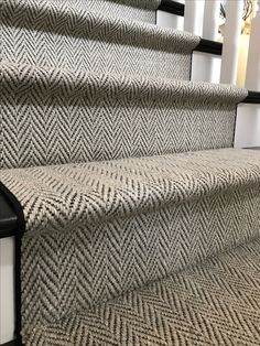 an image of some stairs with carpet on it