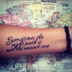 someones wrist tattoo with the words sometimes the bright path is not the easy way