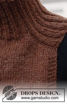 the back of a brown knitted sweater with an open cowl on it's shoulder