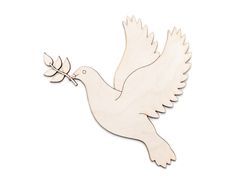 a white dove with an olive branch in its beak is flying through the air on a white background