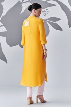 Yellow kurta with contrast thread embroidered floral motifs. Comes with inner slip and pant. - Aza Fashions Floral Embroidery Straight Kurta Set For Work, Spring Workwear Kurta With Resham Embroidery, Spring Resham Embroidery Kurta For Workwear, Fitted Kurta With Chikankari Embroidery For Work, Yellow Kurta, Kurta With Pants, Floral Motifs, Embroidered Silk, Mandarin Collar