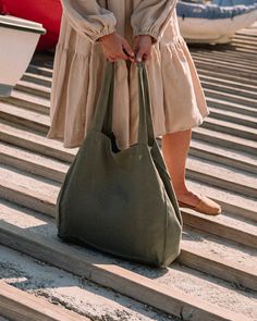 Tote bag is handmade from pure, soft washed linen and has one inside pocket. Linen tote bag is a perfect accessory whether you are doing shopping or going to the beach. Long handles that go over the shoulder make it comfortable to carry. This tote bag is very light, thus when not used it can be easily folded away. Diverse in colors, this tote is a perfect gift for any occasion. DETAILS - Inside pocket - Height 14,5 x Width 21,6 x Bottom 6 in | H 37 x W 55 x B 15 cm (unfolded) - 100% linen - Reus Large Beach Bag, Linen Tote Bag, Large Beach Bags, Bag Summer, Summer Bag, Linen Bag, Eco Friendly Gifts, Reusable Grocery Bags, Market Bag