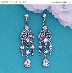 Chandelier Bridal Earrings Crystal Dangle Bride Party Wedding Accessory Accessories Prom Gift Jewelry Drop Brides Gatsby Pageant Weddings Ready to Ship Amazingly Beautiful! Lots of Sparkle! Add a breathtaking touch to your wedding dress with this glamorous and one of a kind bridal earrings! Gorgeous and stunning, these silver plated bridal earrings are made with marvelous Austrian crystals. They would look fabulous for your wedding, prom, party and any special occasion. The earrings will definit Bridal Earrings Chandelier, Bride Party, Prom Gift, Crystal Bridal Earrings, Wedding Accessory, Earrings Crystal, Gift Jewelry, Bridal Earrings, Gatsby