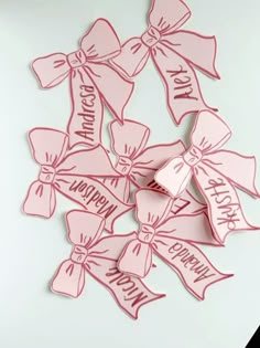 pink bows with happy birthday written on them are arranged in the shape of a bouquet