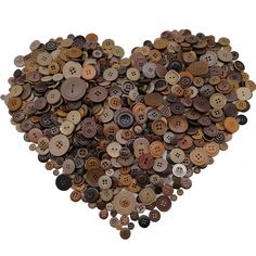 a heart made out of buttons on a white background