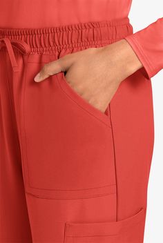 This Modern Classic fit trouser pant has a mid rise elasticized waist with drawstring. There are a total of four pockets for storage: two front patch pockets and two cargo pockets with reverse hem trim. Decorative tonal topstitching and elasticized hems finish this style. • Modern classic fit • Mid Rise • Elastic waistband with drawstring • Straight leg • Total of 4 pockets • 2 front pockets • 2 cargo pockets • Approximate inseam for size M is: Regular 31 • Manufacturer style CK272A Workwear Ori Straight Leg Joggers With Pockets For Workwear, Workwear Joggers With Side Pockets, Solid Color Straight Leg Joggers With Pockets, Solid Straight Leg Joggers With Pockets, Stretch Straight Joggers With Pockets, Stretch Solid Color Cargo Pants With Elastic Waistband, Stretch Fit Solid Cargo Pants With Elastic Waistband, Cargo Scrub Pants, Uniform Advantage