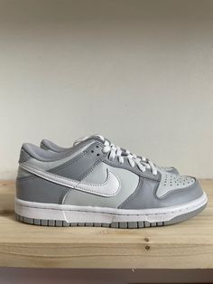 Release Year: 2022 Color: Pure Platinum / White-Wolf Grey Product Code: DH9765-001 A light grey leather upper, darker grey overlays and white swooshes to finish off. Nike Dunk Low White Pure Platinum Wolf Grey, Nike Dunks Wolf Grey, Nike Dunk Wolf Grey, Two Tone Grey Dunks Outfit, Nike Two Tone Grey, Pure Platinum Wolf Grey Dunks Outfit, Pure Platinum Wolf Grey Dunks, Nike Dunk Low Two Toned Grey, Light Grey Dunks