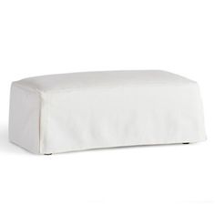 a white ottoman cover sitting on top of a table