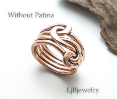 Finished with traditional metalsmith techniques, this warm earthy copper knot ring is perfect for both men and women. Having both a classic and Celtic style, it is a perfect promise ring for that someone special in your life, a great friendship ring or an anniversary gift that will last a lifetime. The flexible bands of this knot ring make it very comfortable to wear everyday and perfect for your casual style. Because this copper double knot ring is made to order there may be variations from the Friendship Knot, Knot Rings, His And Hers Rings, Double Rings, Celtic Ring, Wire Wrapped Jewelry Diy, Copper Anniversary, Friendship Ring, Love Knot Ring