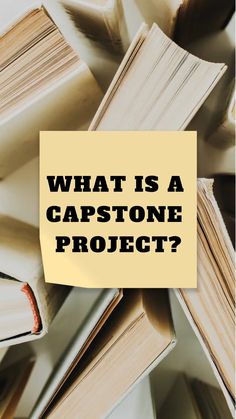 a pile of books with the words what is a capstone project? on it