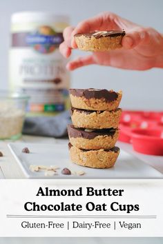 almond butter chocolate oat cups stacked on top of each other