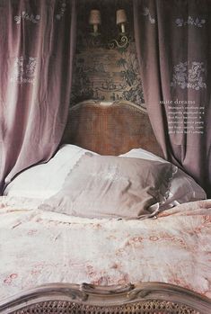 an image of a bed with curtains over it