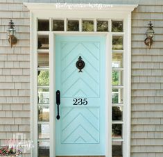 a blue front door with the number 19001 on it