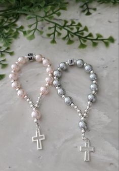 "Beautiful personalized small rosaries made with glass pearl beads with silver plated beads & silver plated cross or an angel, these finger rosaries are perfect baptism favors, baby shower favors, first communion favors, Bridesmaids gifts They are not stretchy You can choose from 2 options either the cross or an angel from the drop down menu Choose the color that you want for your rosary Please send me a note of what letter you want on your rosary before you check out Bead size: 8mm Length: 4\" Each rosary will be packed in a white organza bag 7cm x 9cm Ready to ship within 1-2  business days Thanks for stopping by my shop :)" Cheap Personalized Rosary Bracelet As Gift, Pocket Rosary Diy, Silver Beaded Jewelry For Baptism, Silver Baptism Jewelry With 8mm Beads, Silver Beaded Rosary For First Communion, Silver Jewelry With 8mm Beads For Baptism, Personalized Silver Rosary For Confirmation, Personalized Silver Rosary Bracelet For Mother's Day, Handmade Silver Rosary For Baptism